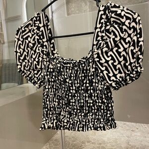 Elegant Black and White Patterned Blouse